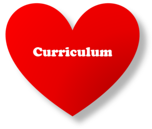 heart icon with curriculum written inside